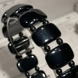 Kralen armbanden Hematiet platovaal 20mm met beads 4 of 6mm Black Onyx Agaat