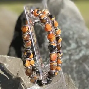 Armbanden JaXX Oranje facet 6/8 mm met RVS spacers