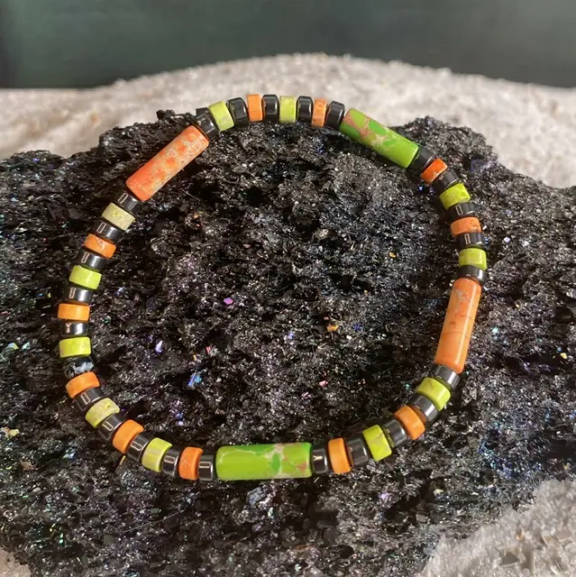 Armband Heishi oranje en groen met Hematiet