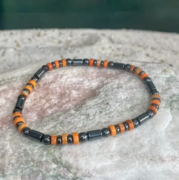 Armbanden platte heishi kralen 4x2mm oranje