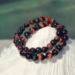 Kralen armband Tijgeroog 10/12 mm donker bruin met Boeddhistische houten Jujube kralen