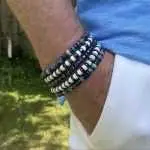 Armbandset 5-delig Heishi kralen Howliet / blauw 6mm en Hematiet