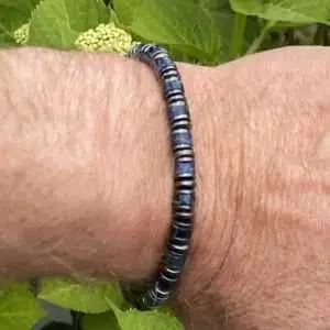 Armband Jackson met Heishi kralen donker blauw gemêleerd 6mm en Hematiet